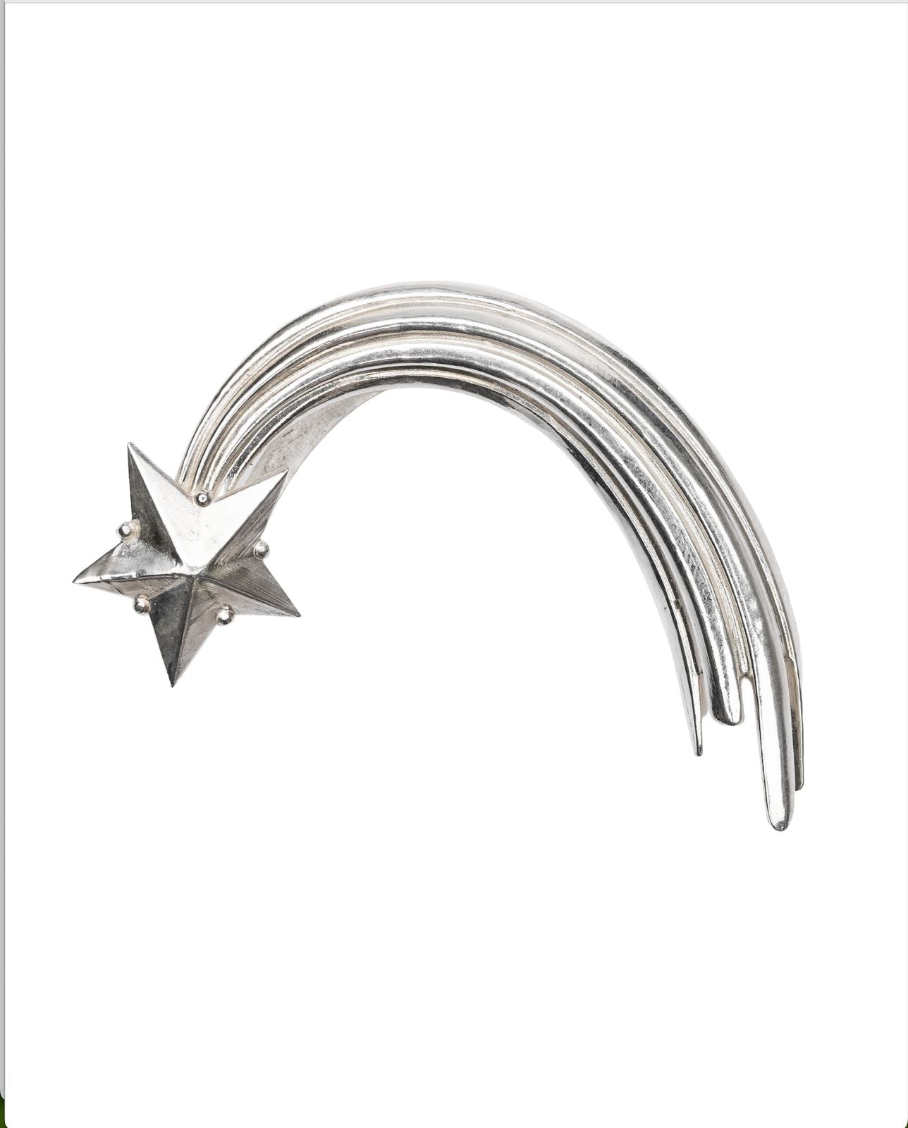 Silver Comet ear cuff on a white background